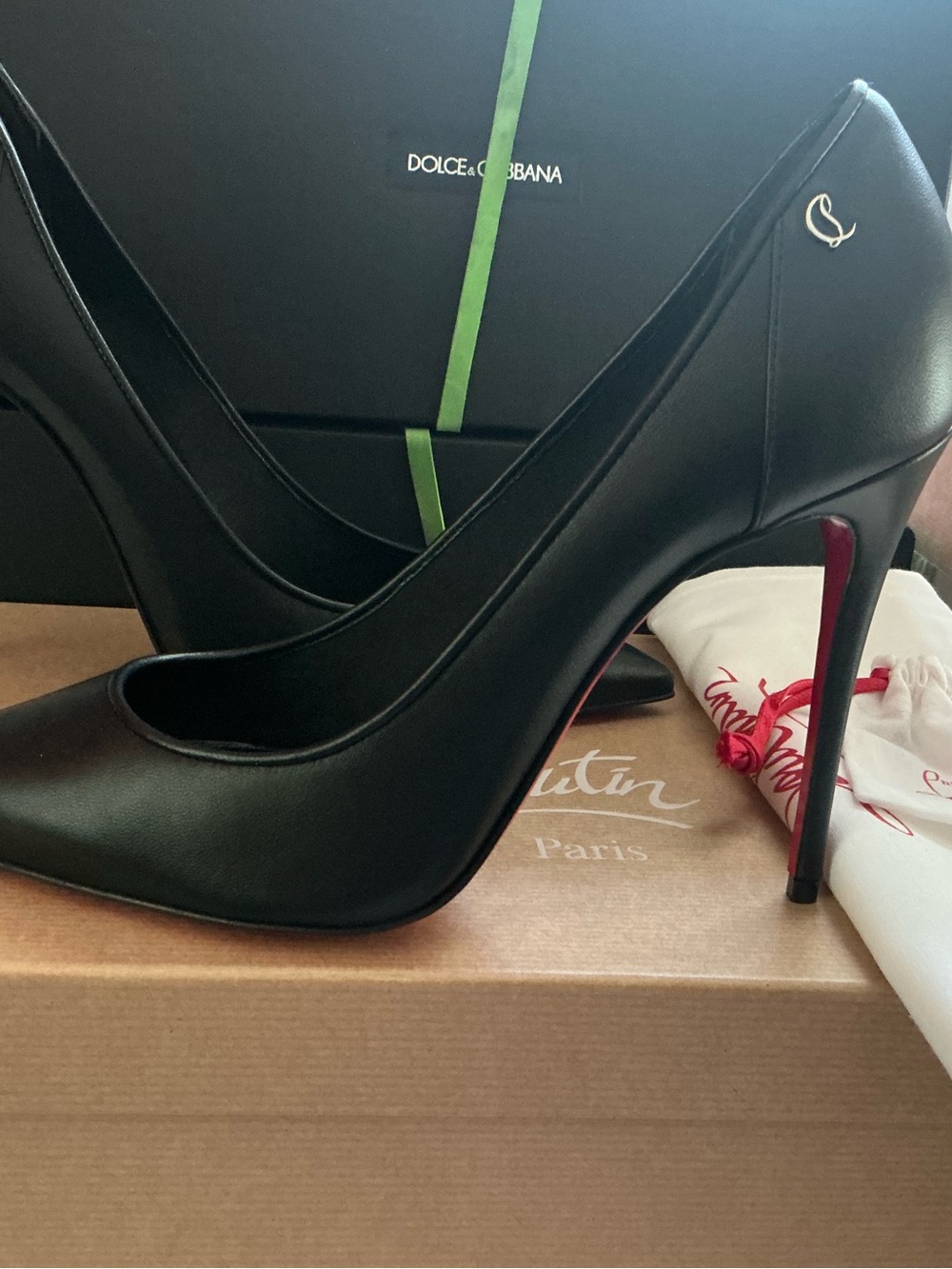 Dolce & Gabbana Black Leather Stiletto Pumps with Red Soles